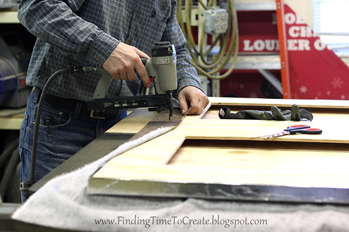 Magnet board fabric stapled