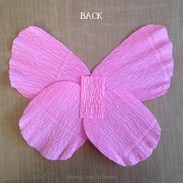 Hot glue butterfly crepe paper layers - back